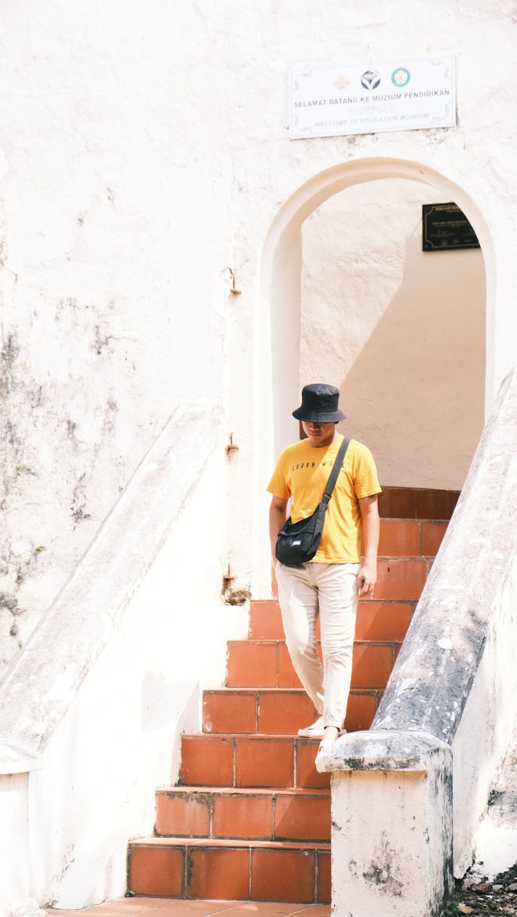 Man Walking Down The Stairs 