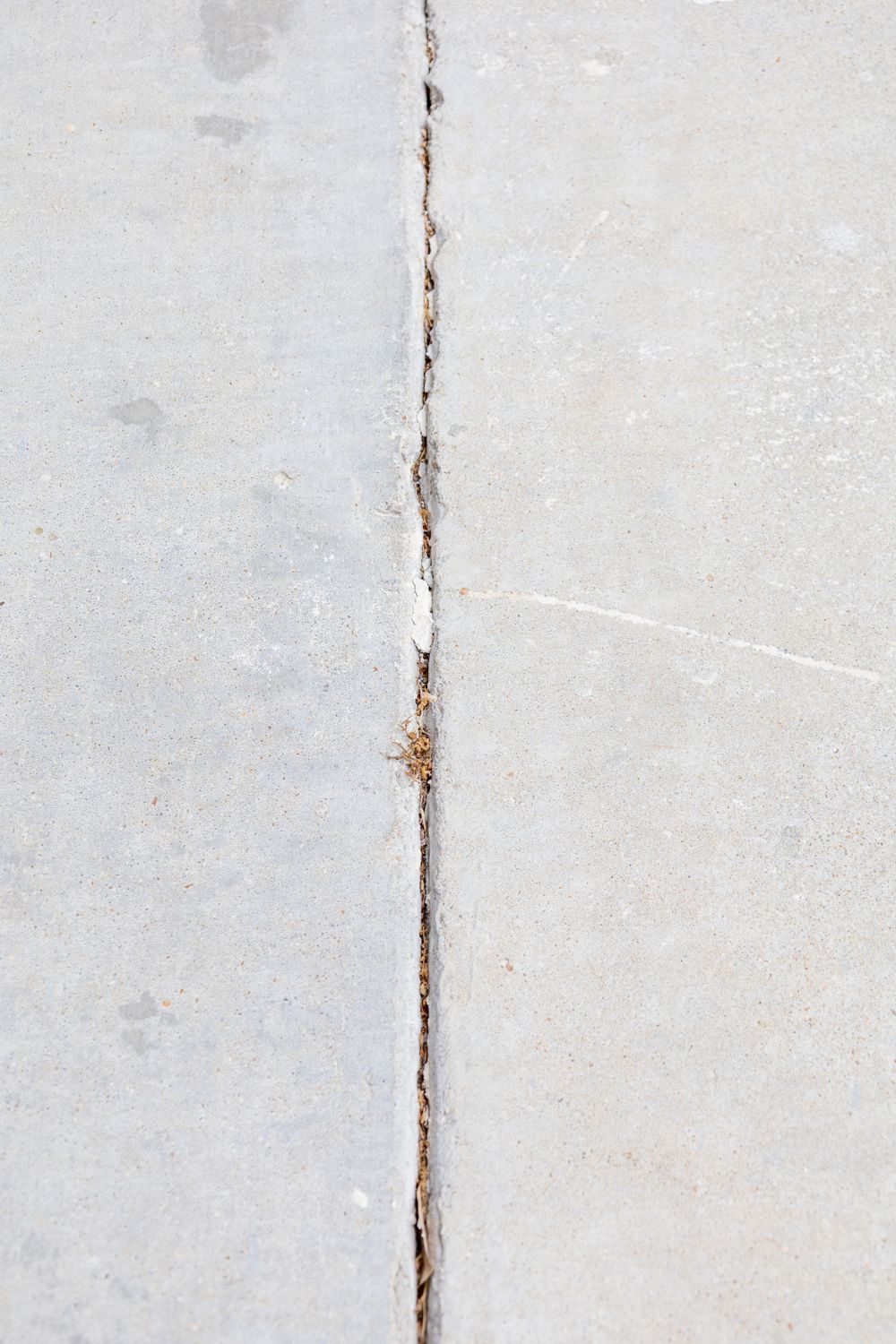 Damaged pavement in a public parking area