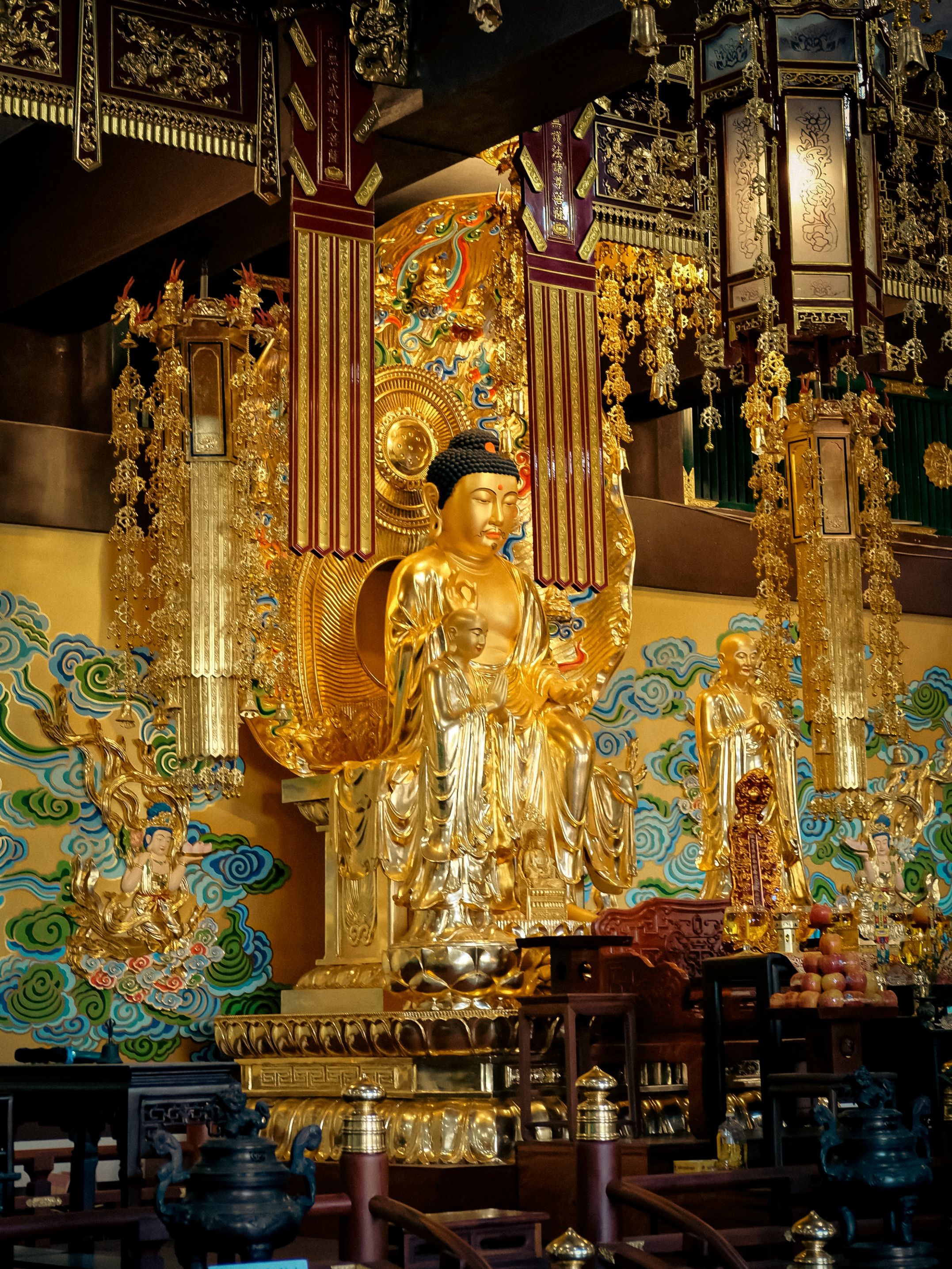 Interior of a Temple with a Golden Statue of Buddha · Free Stock Photo
