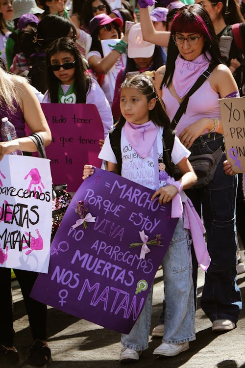 Children with Banners in Crowd