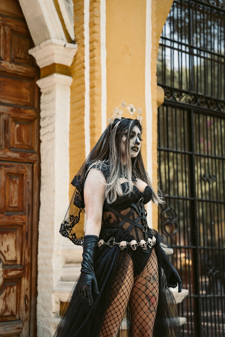 Woman In Goth Halloween Costume And Makeup 