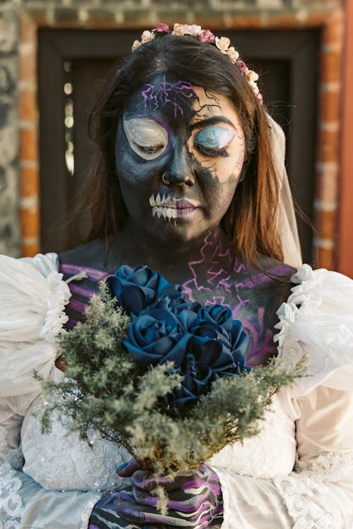Woman in Halloween Makeup and a Bride Costume 