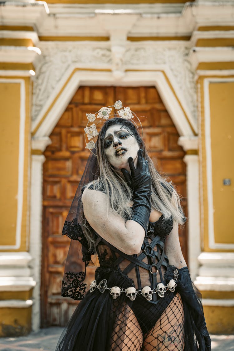 Woman In Goth Halloween Costume And Makeup 