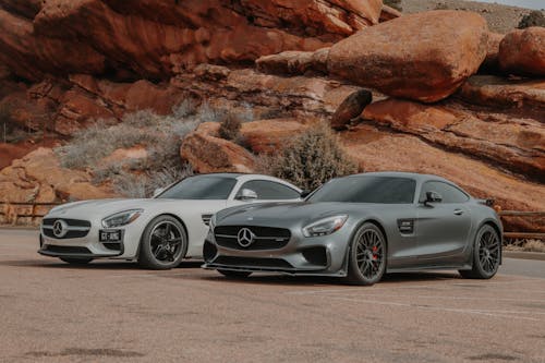 Luxury Mercedes Cars Parked near Geological Formations 