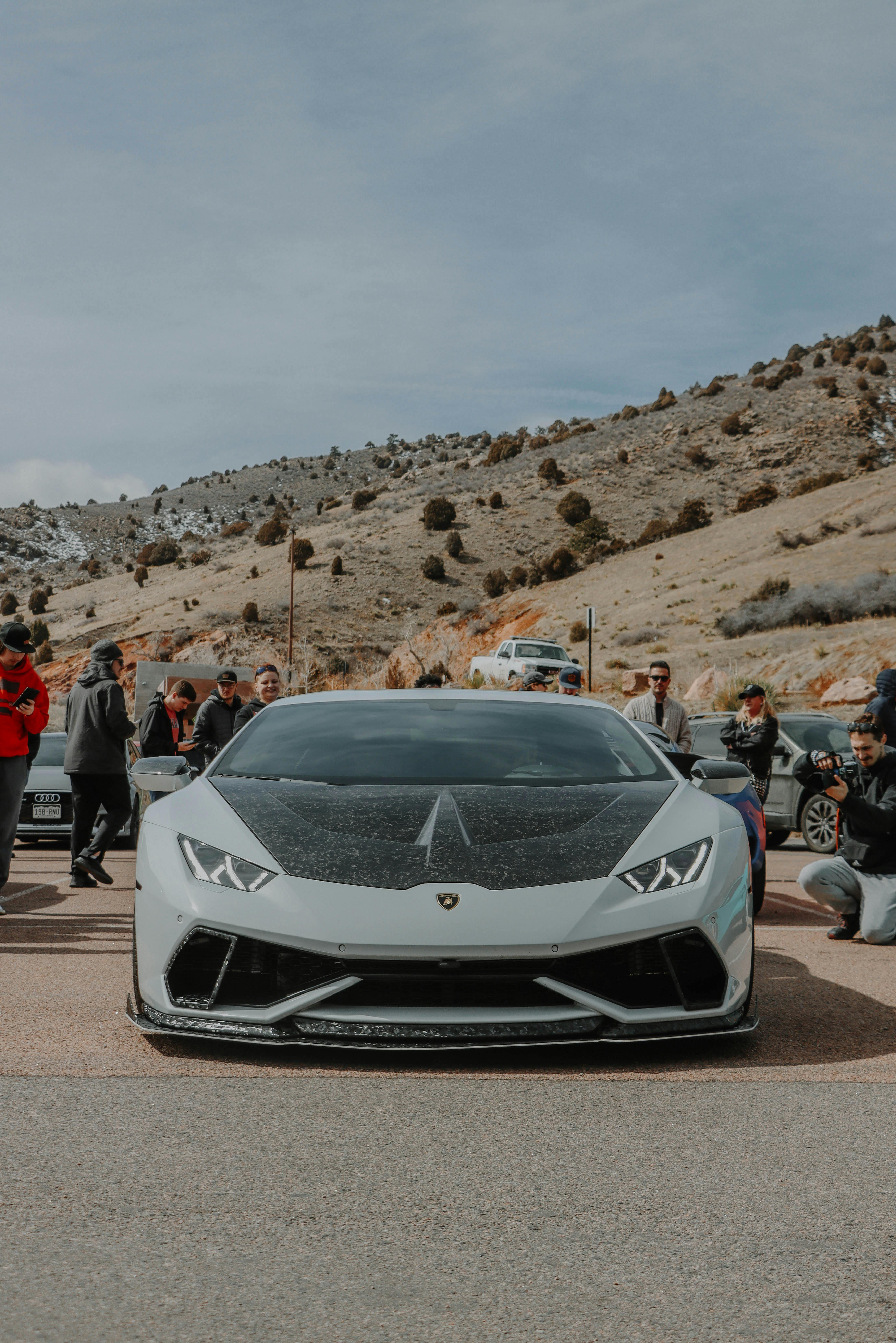 a lamborghini huracan on a parking lot at red rocks colorado usa