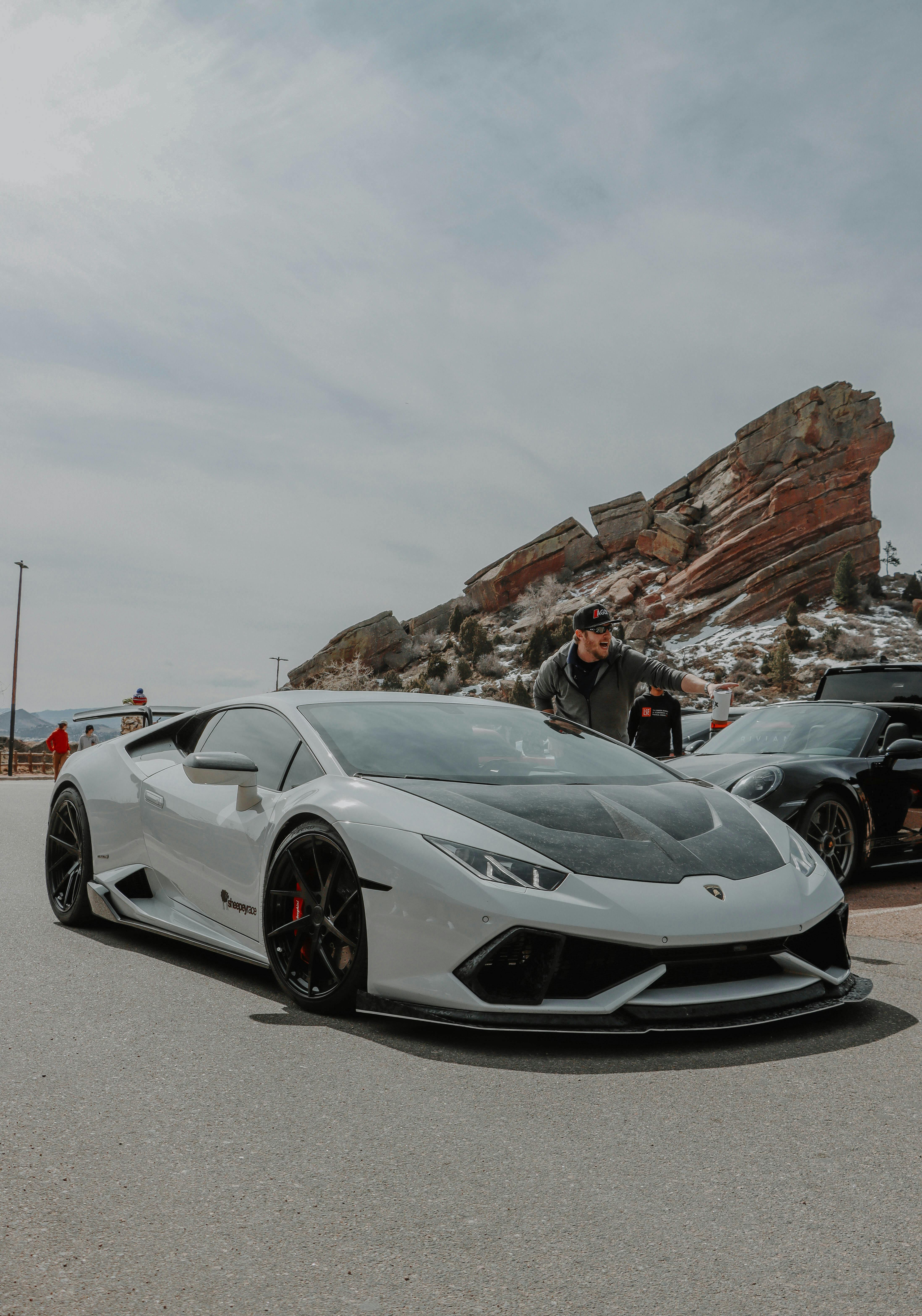 a lamborghini huracan on a parking lot at red rocks colorado usa