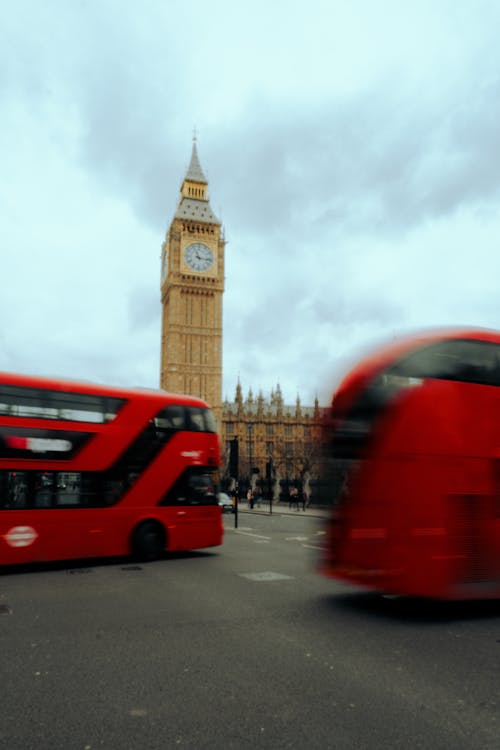 Clouds over Big Ben and Red Buses