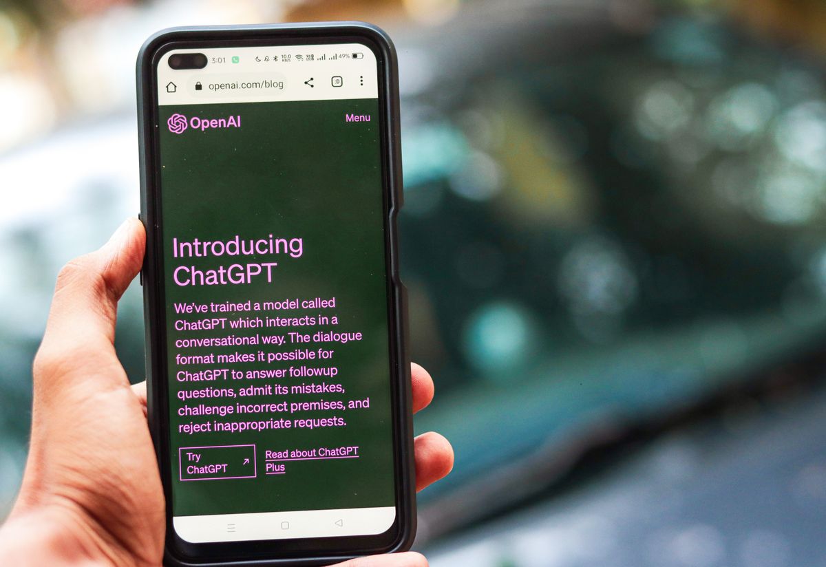 What a code-switching-ready chatbot does differently Hand holding a smartphone showing an AI assistant