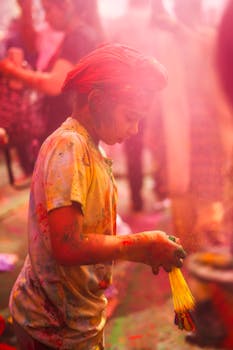 A child immersed in the vibrant colors of Holi festival, capturing the essence of cultural celebration.