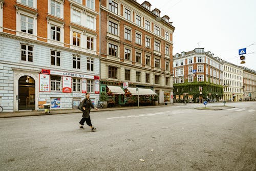 A Woman Crossing a Street 