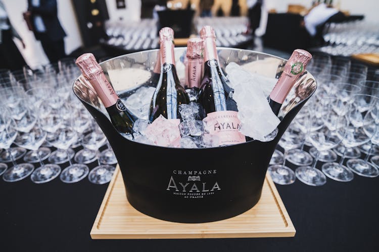 Champagne Bottles In An Ice Bucket 