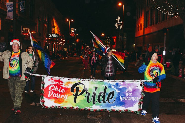 People In Parade With Banner