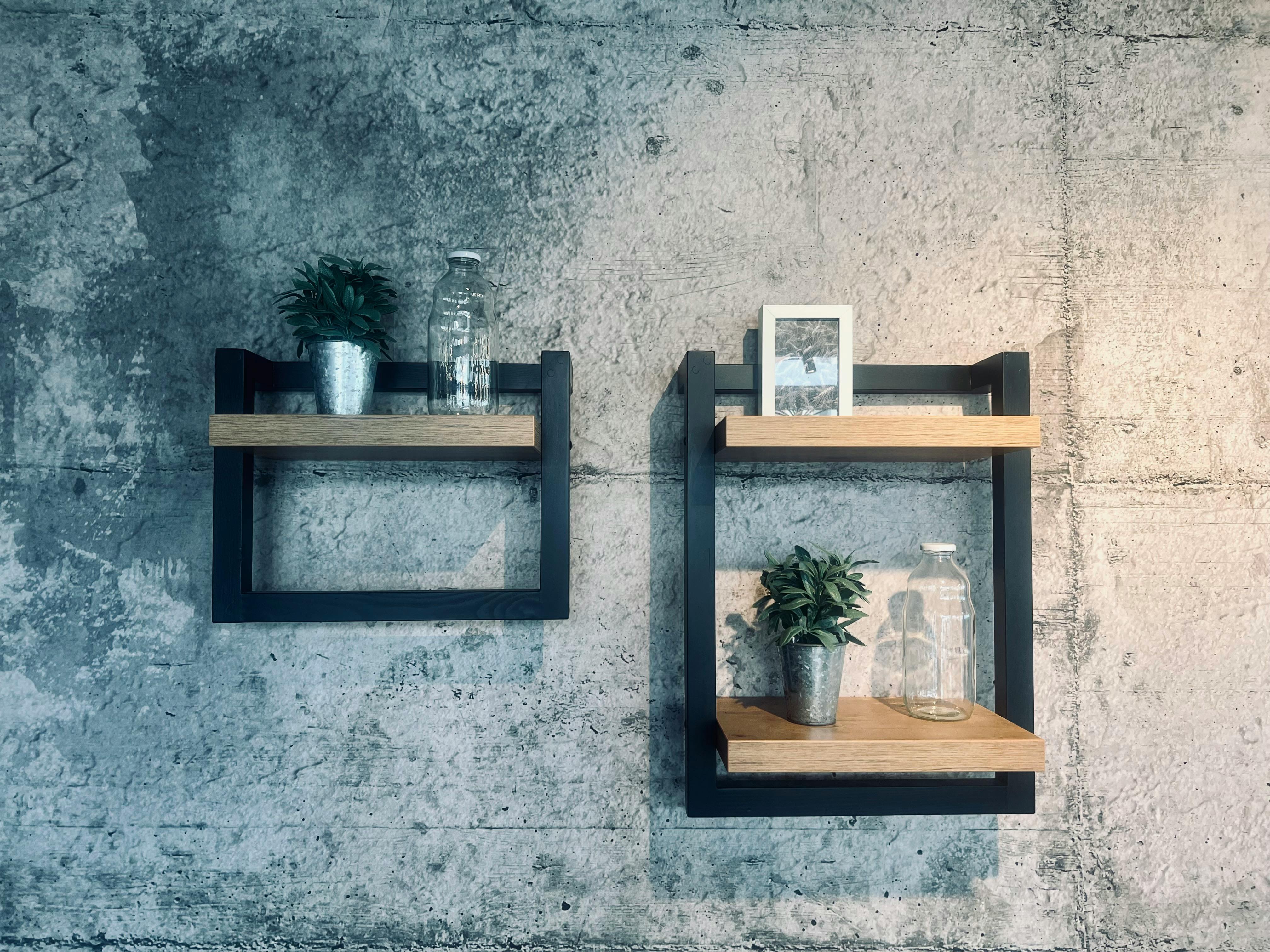 Modern plant stand with potted plants in urban apartment living room