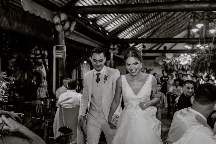 Wedding Couple Walking Among Guests