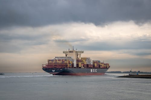 View of a Loaded Container Ship on a Sea 