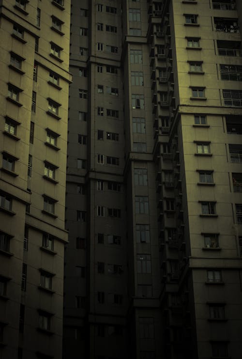 Facade of a Tall Apartment Block in City 