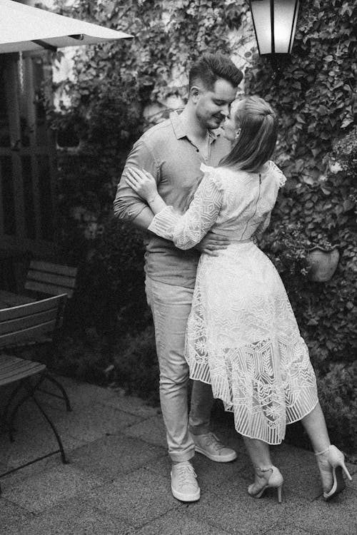 Black and White Photo of a Couple Embracing 