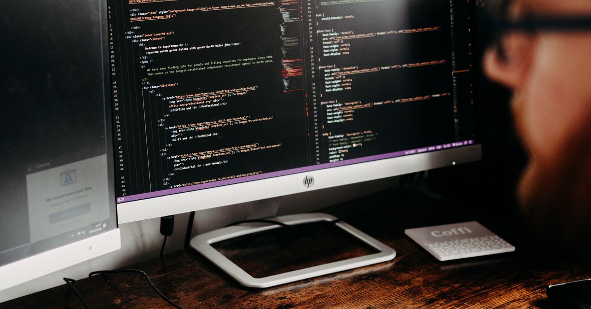 Man Coding on PC · Free Stock Photo