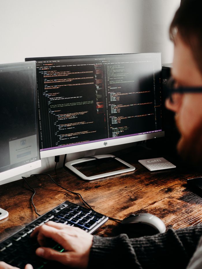 Developer focused on code across multiple screens