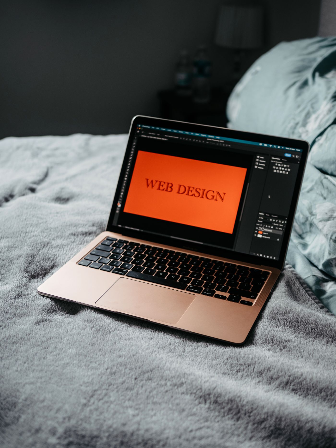 Laptop displaying website design and development work