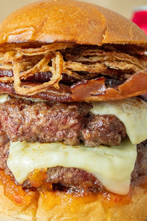 Foto profissional grátis de alimento, cheeseburger, comida rápida