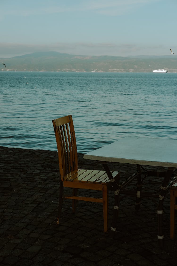 Table And Chair By Sea