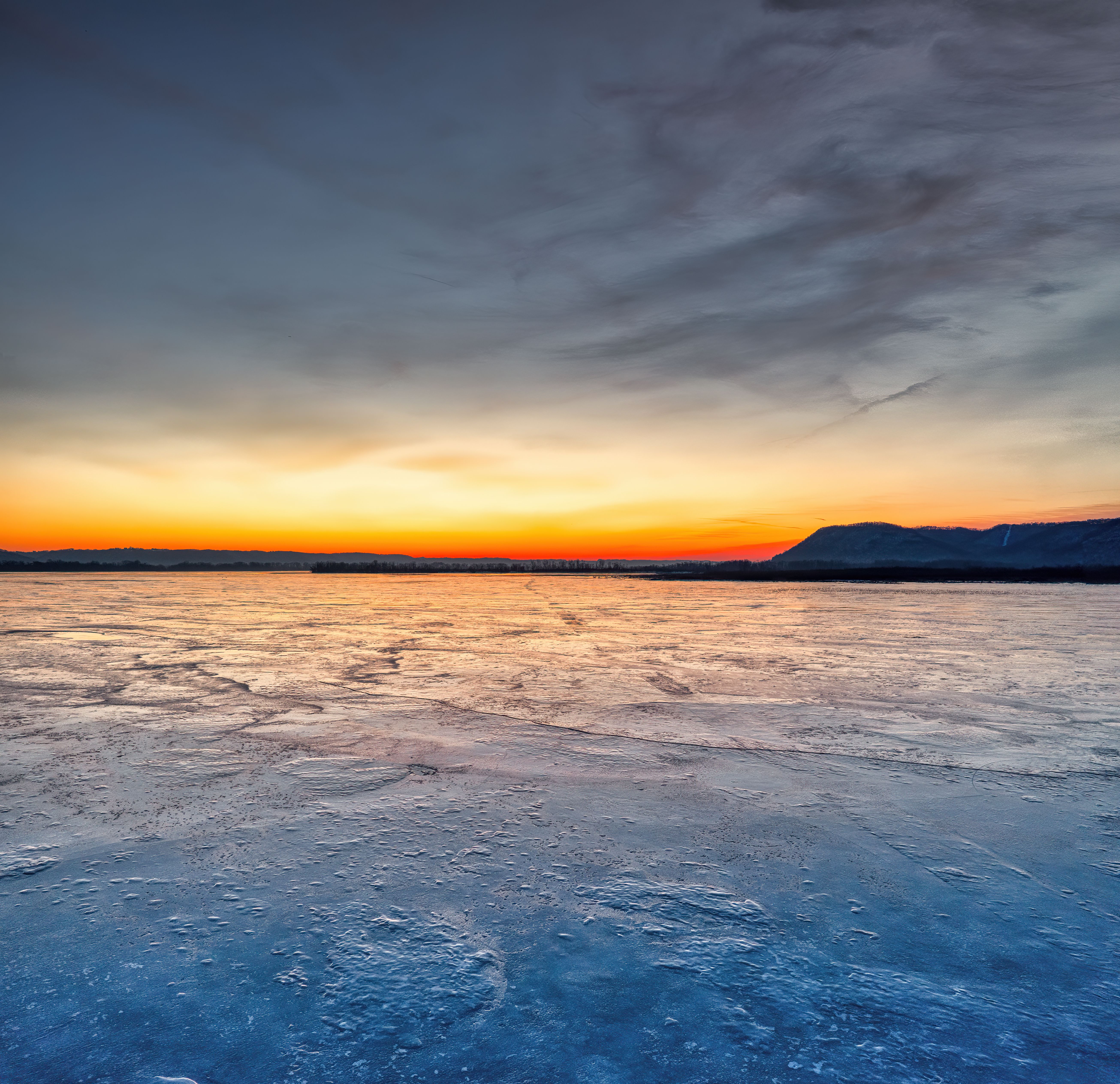 Surface of a Frozen Lake at Dusk · Free Stock Photo