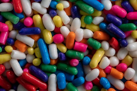 Vibrant close-up image of multicolored candy sprinkles, perfect for a sweet theme.