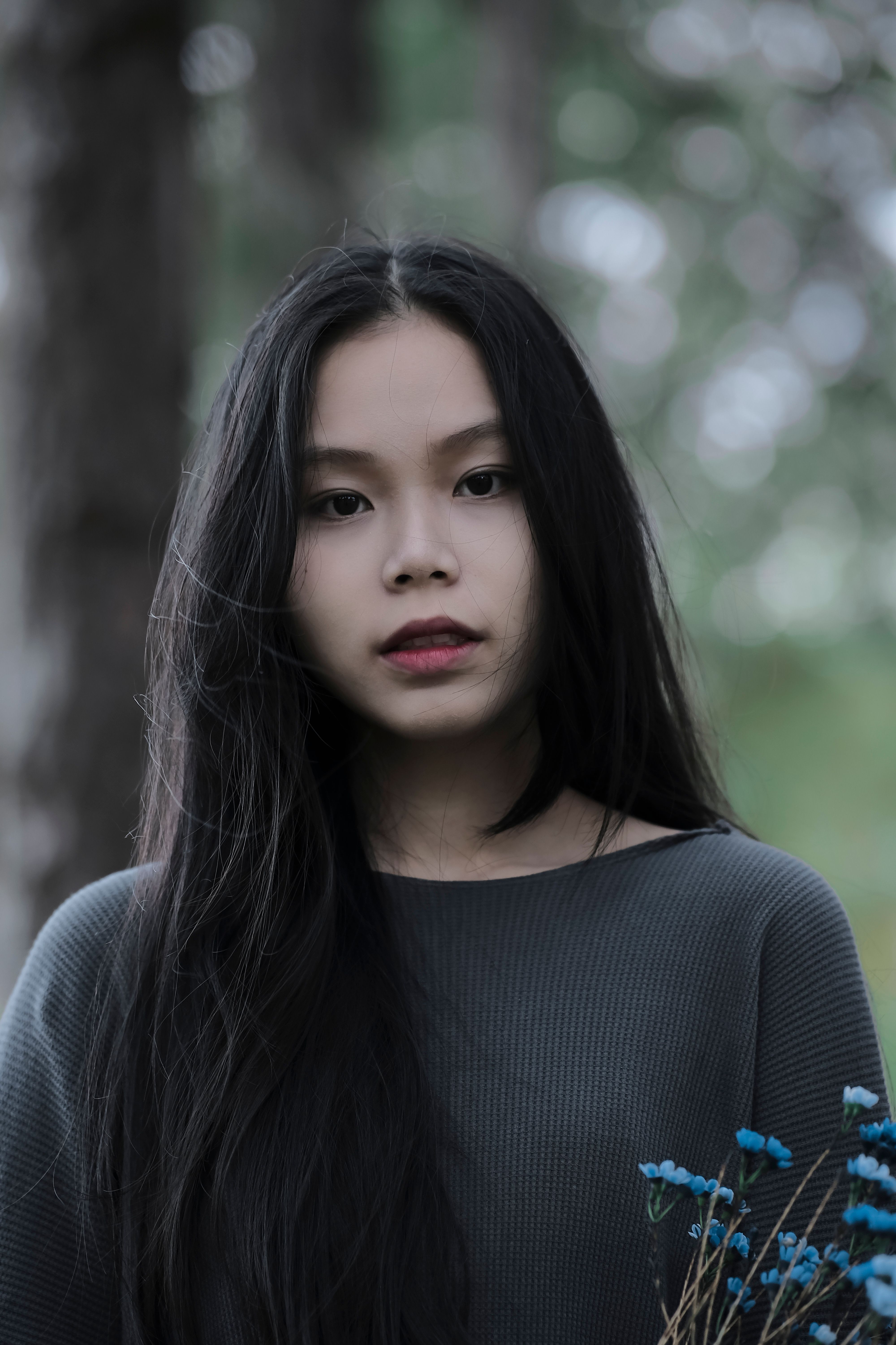 Portrait of Beautiful Young Woman with Long Hair · Free Stock Photo