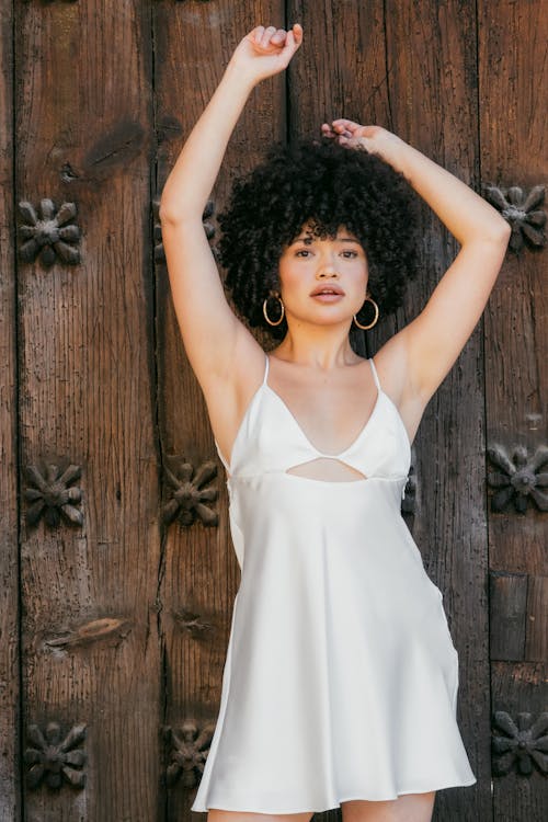 Young Woman in a White Mini Dress 