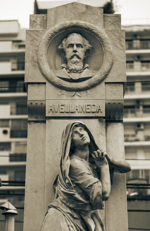 Free Sculpture on the Grave at the La Recoleta Cemetery in Buenos Aires, Argentina Stock Photo