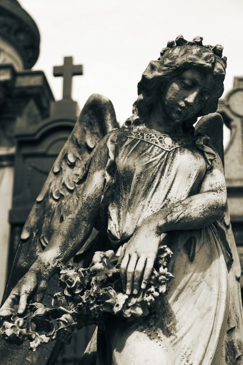 Free Elegant angel statue in La Recoleta Cemetery, Buenos Aires, capturing serene beauty and historical artistry. Stock Photo