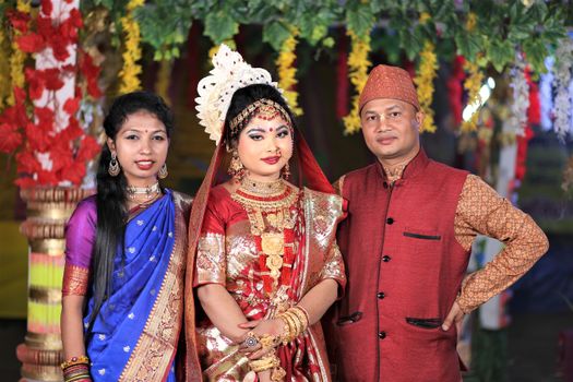 Photo of People Wearing Decorative Traditional Clothing