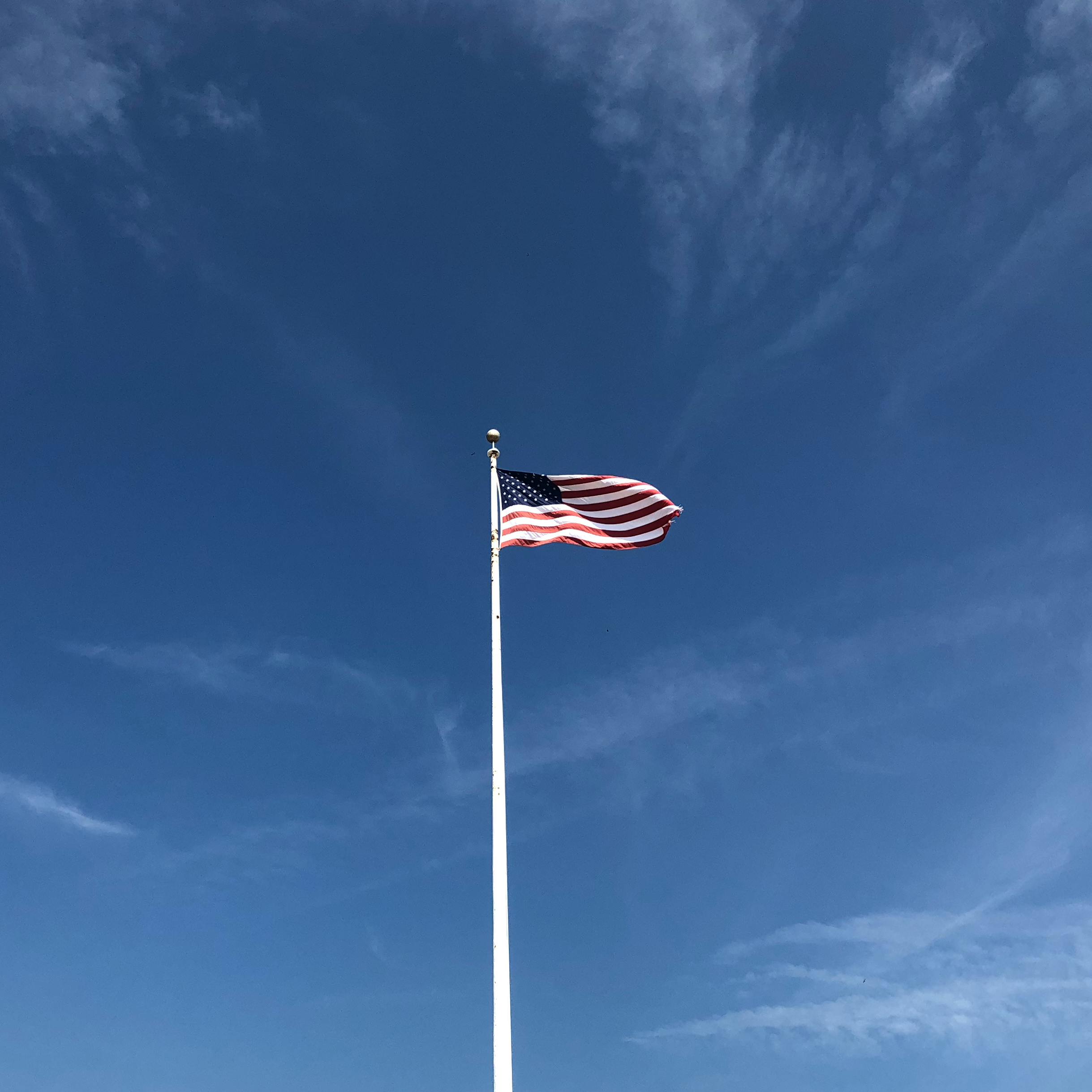 American Flag under Blue Sky