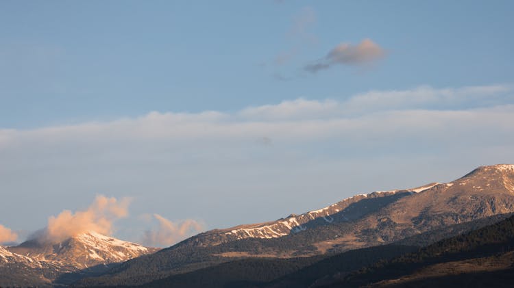 Mountains Against The Sky At Sunrise 