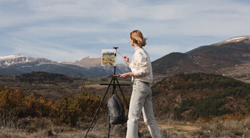 Woman Painting Hills