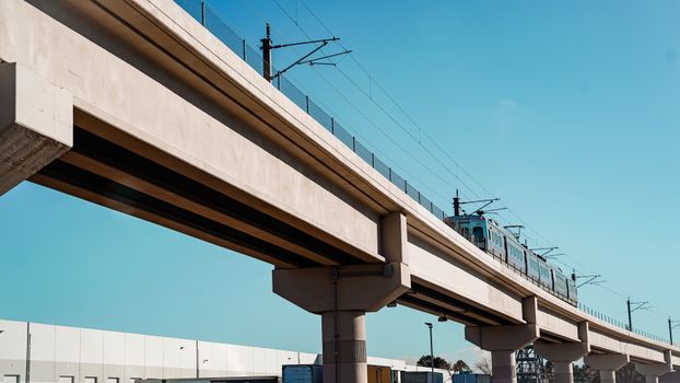 A Train Riding through a Flyover 