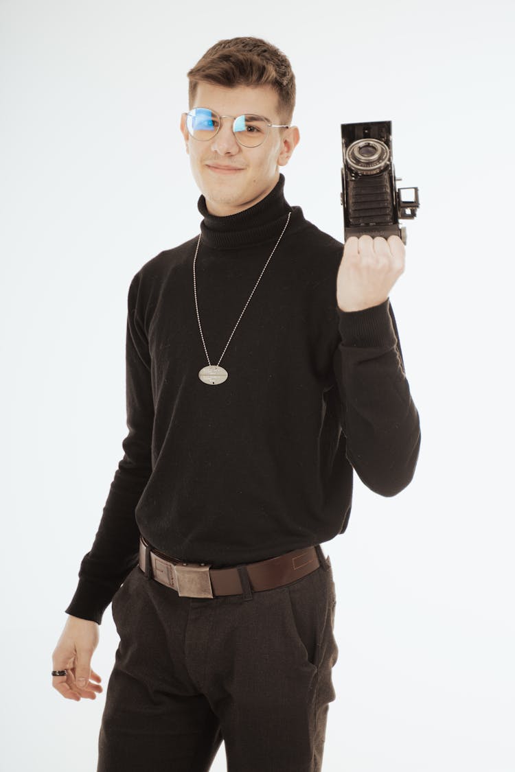 A Young Man Wearing Black Outfit