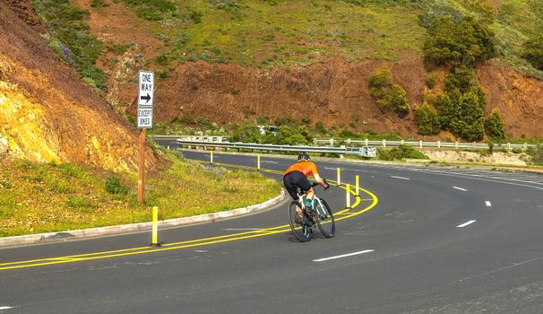 Cyclist on Road Bicycle on Road