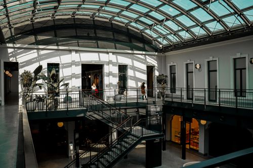 Free Spacious atrium with a glass ceiling illuminating modern architecture in Ankara, Türkiye. Stock Photo