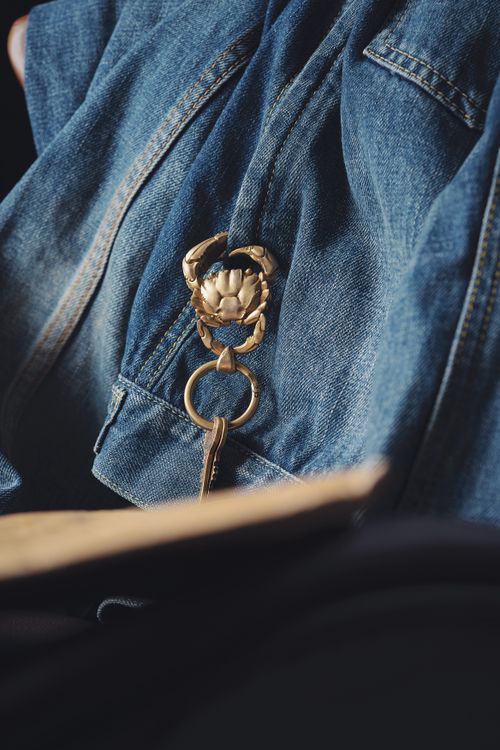Golden Key Ring on Denim Jacket · Free Stock Photo