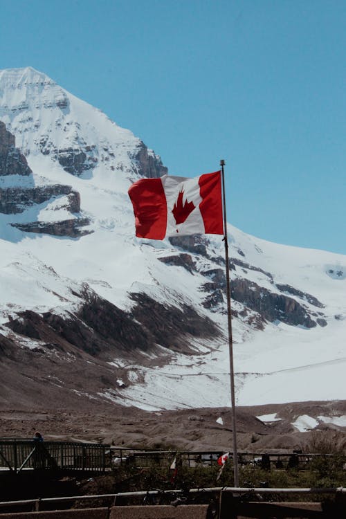 Flag of Canada near Mountain