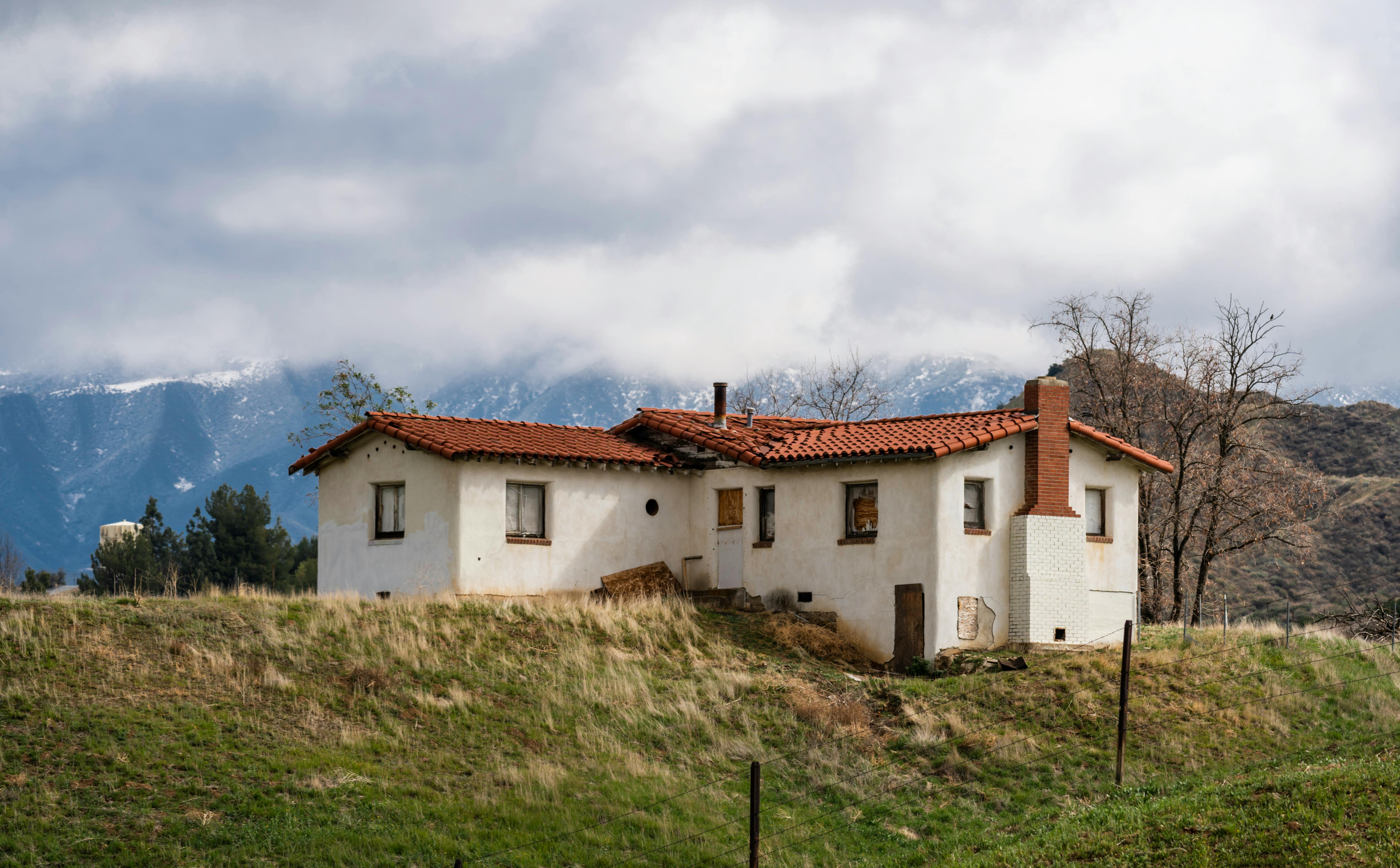 Charming rustic house in Calimesa, CA, set against scenic mountain backdrop.