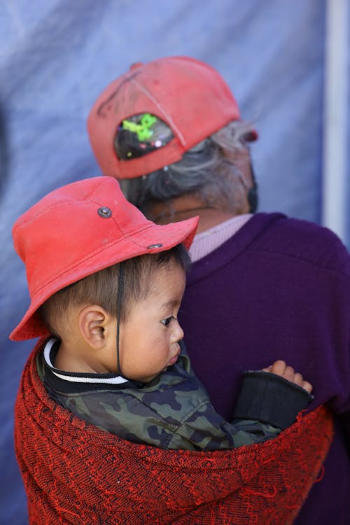 Old Man Carrying Child on Back