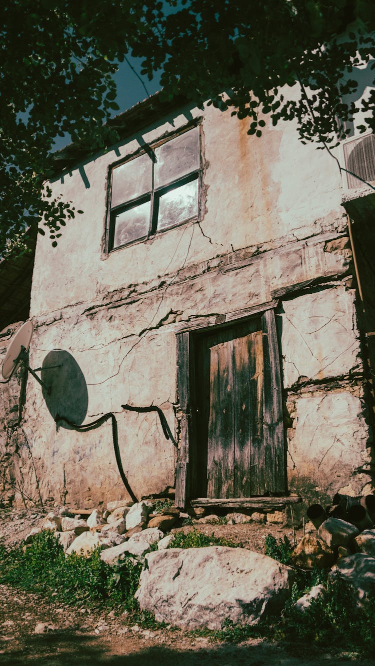 Abandoned Old Stone House Facade