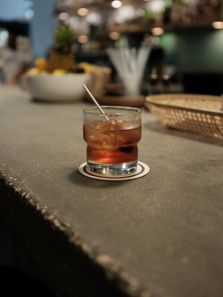 Drink In Glass On Counter In Bar