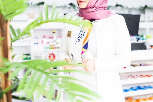 A Woman Standing in a Store 