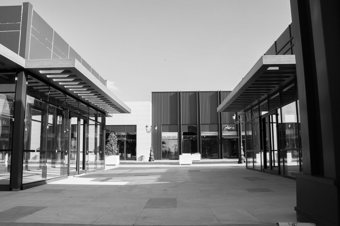 Open-air commercial shopping center with storefronts