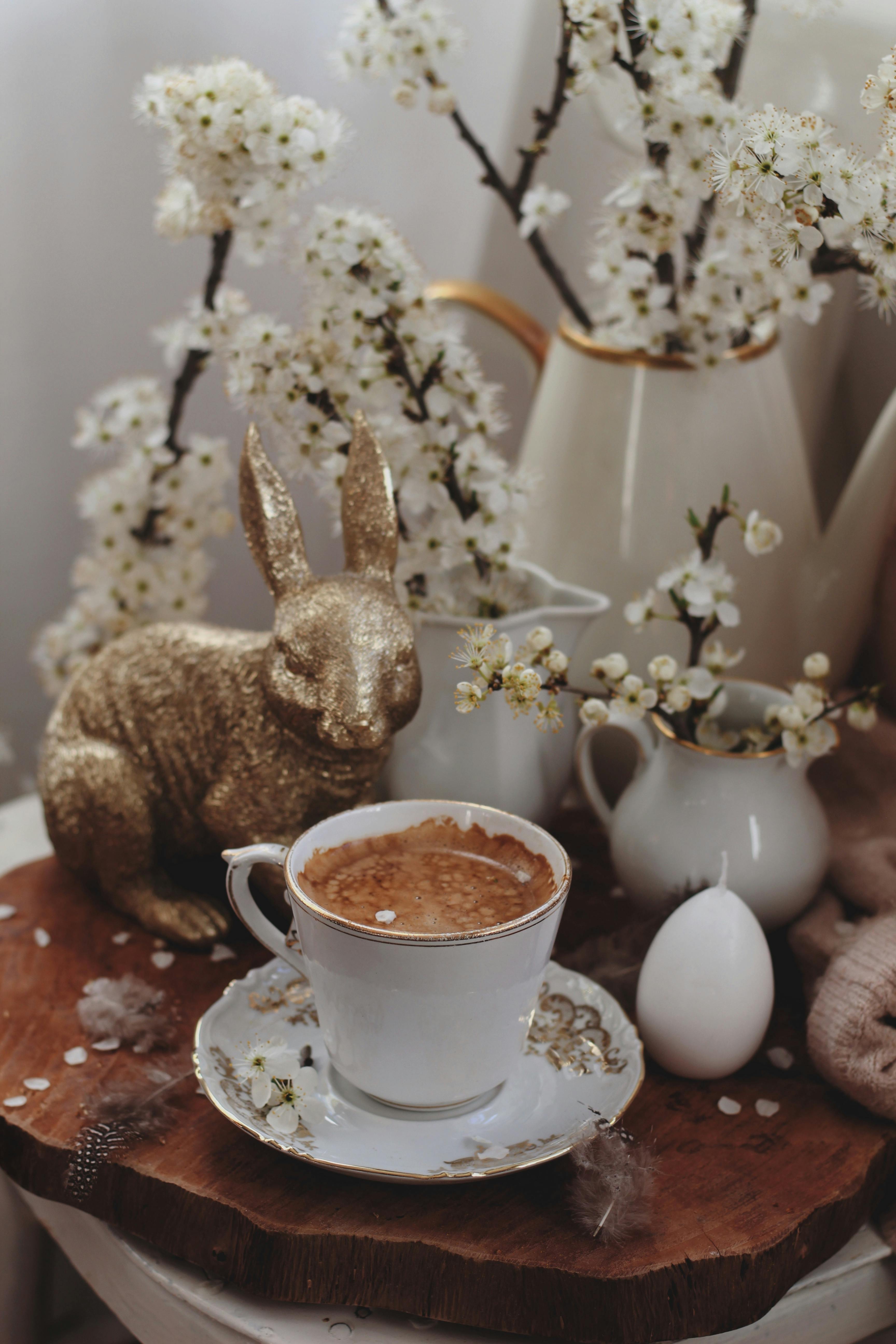 Cup of Coffee on Messy Table · Free Stock Photo