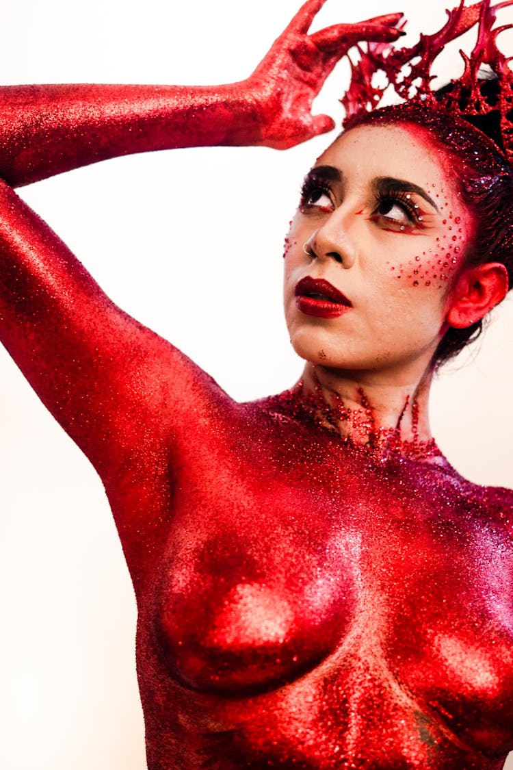 Naked Woman With Red Paint On Body